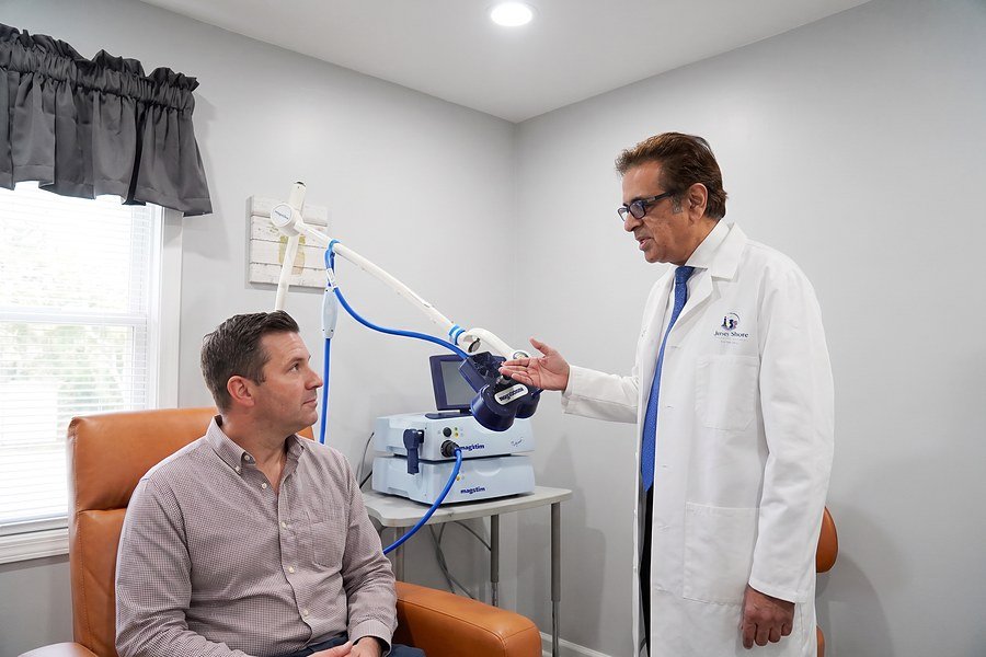 Dr. Abbas positioning the Magstim TMS coil for a patient at Jersey Shore Psychiatric Services